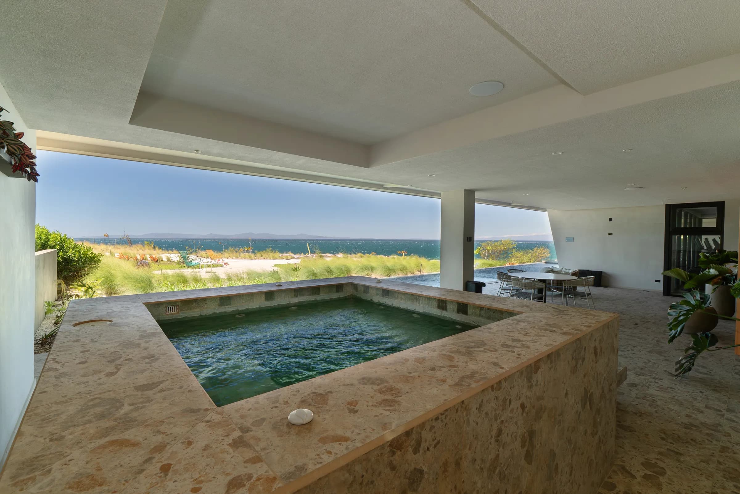Covered jacuzzi with panoramic ocean view